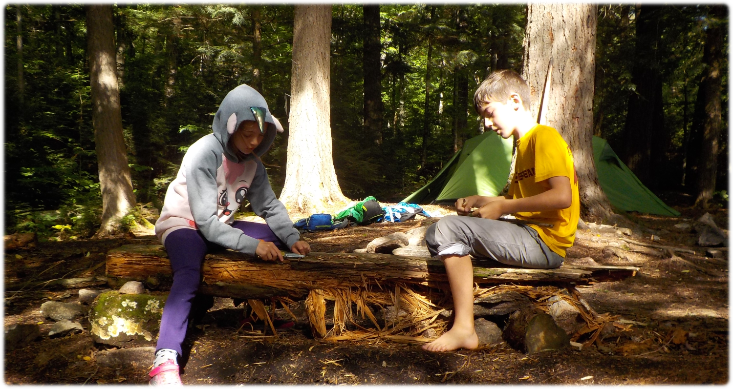 Katherine and William whittling together