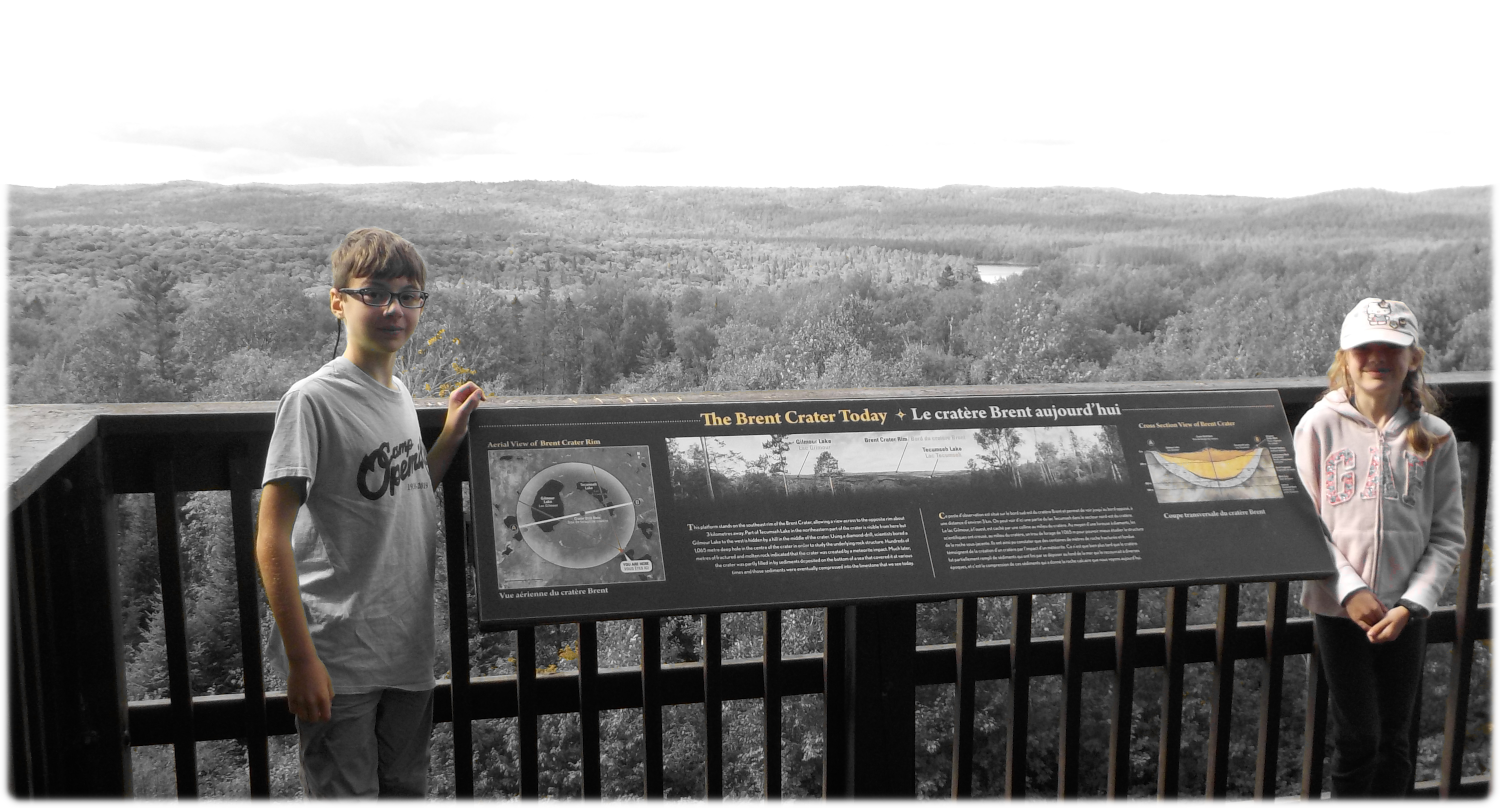 William and Katherine in front of a crater that is older than life